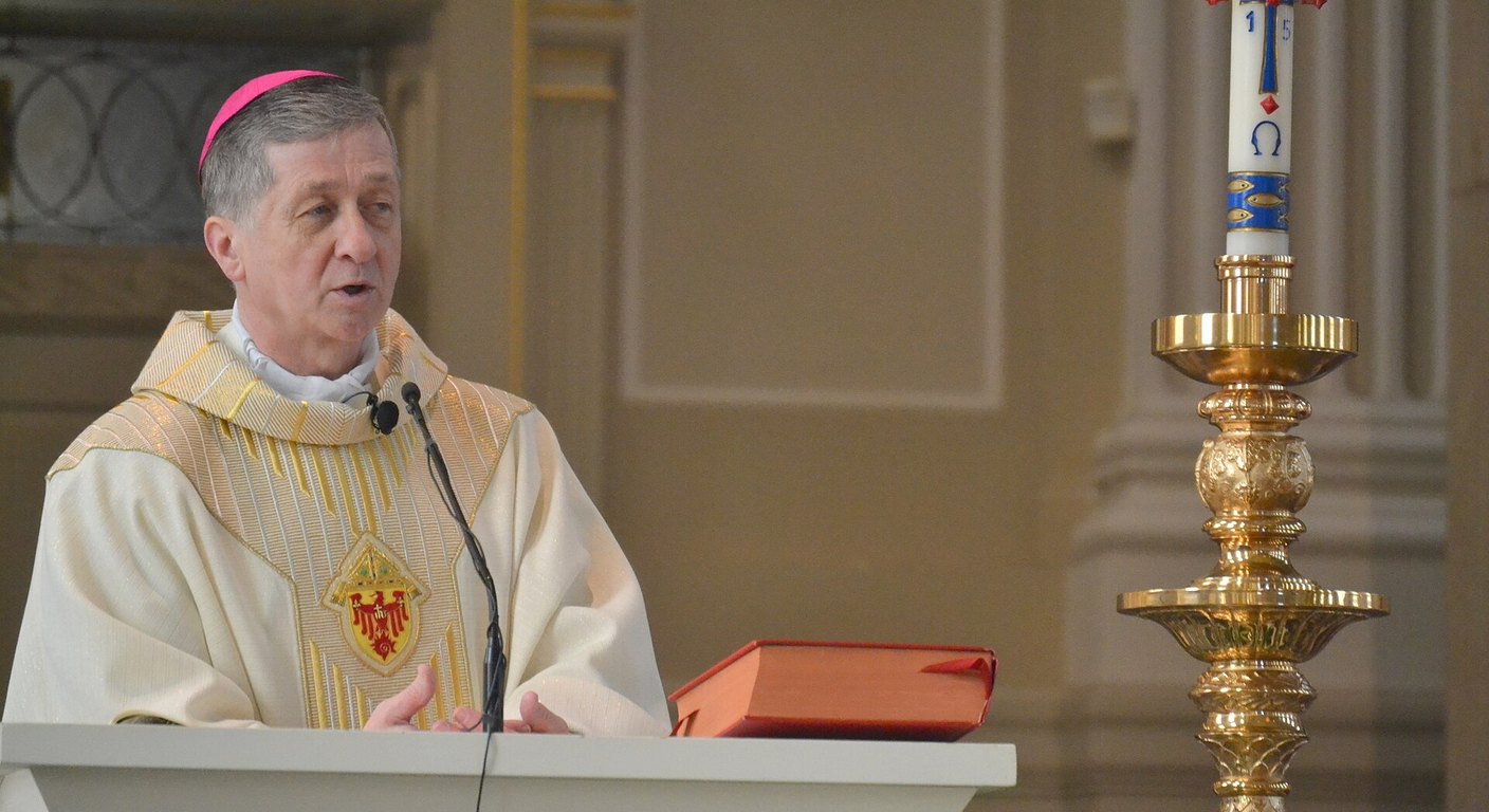 Cardinal Blase Cupich, Archbishop of Chicago, speaking at a pulpit during Mass